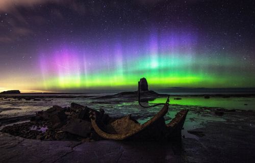 Northern lights over Saltwick Bay Credit Andy Dawson Photography